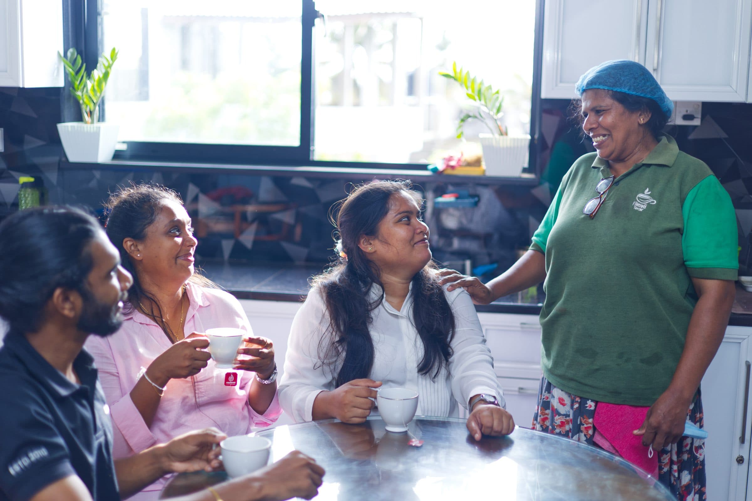 The team on a tea break in the canteen